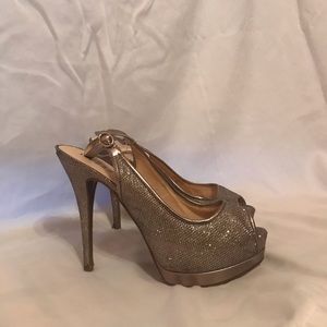 Guess gold platform heels